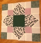 Quatrefoil-block