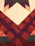 close up of quilted border around star