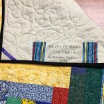 Tag for Heart of Home Log Cabin quilt for Calder